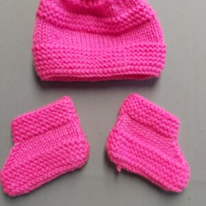 Hand knitted booties and bonnet